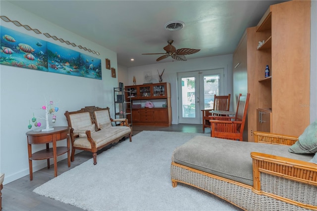 33 Cypress Dr, Palm Harbor, FL 34684 - living area featuring a ceiling fan and baseboards