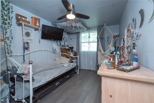 33 Cypress Dr, Palm Harbor, FL 34684 - bedroom with wood finished floors and ceiling fan