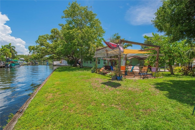 33 Cypress Dr, Palm Harbor, FL 34684 - view of grassy yard with a patio area