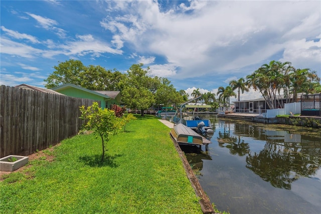 33 Cypress Dr, Palm Harbor, FL 34684 - dock area featuring a water view and boat lift