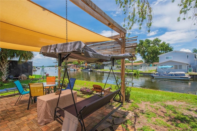 33 Cypress Dr, Palm Harbor, FL 34684 - view of patio with a water view and outdoor dining area