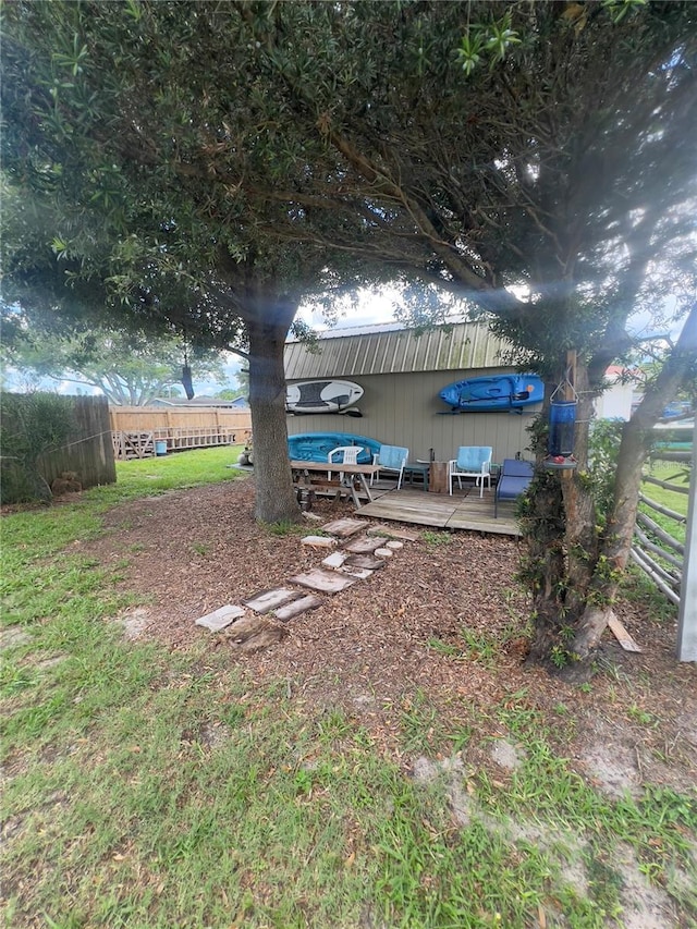 33 Cypress Dr, Palm Harbor, FL 34684 - view of yard featuring a wooden deck