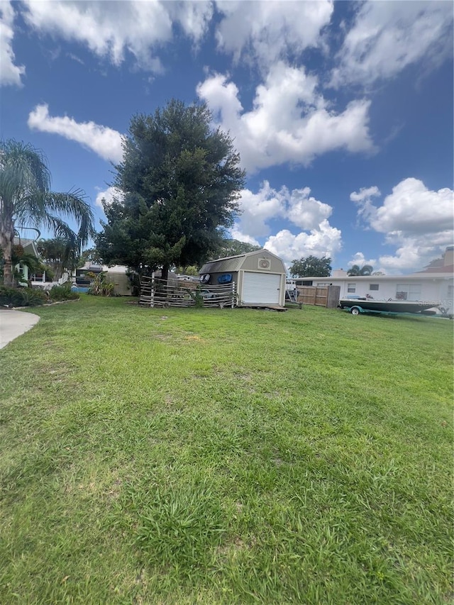 33 Cypress Dr, Palm Harbor, FL 34684 - view of yard featuring an outdoor structure
