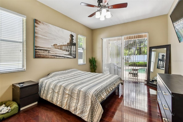 2009 Raven Manor Dr, Dover, FL 33527 - bedroom with access to outside, dark wood-style flooring, and ceiling fan