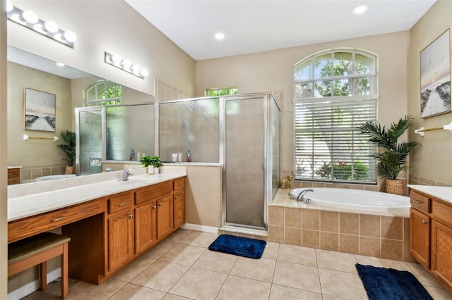 2009 Raven Manor Dr, Dover, FL 33527 - bathroom featuring vanity, healthy amount of natural light, tile patterned flooring, a bath, and recessed lighting