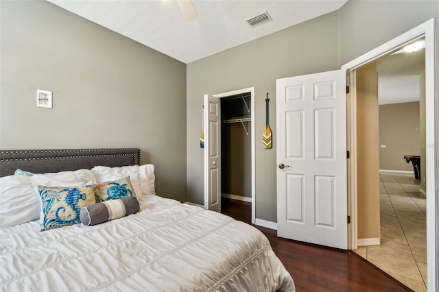 2009 Raven Manor Dr, Dover, FL 33527 - tiled bedroom featuring a ceiling fan and a closet