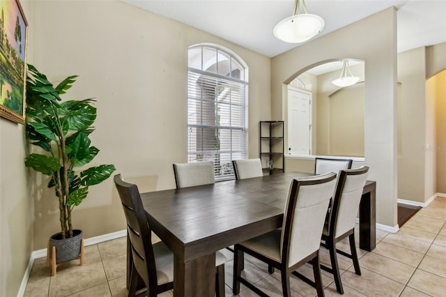 2009 Raven Manor Dr, Dover, FL 33527 - dining room featuring arched walkways and light tile patterned flooring
