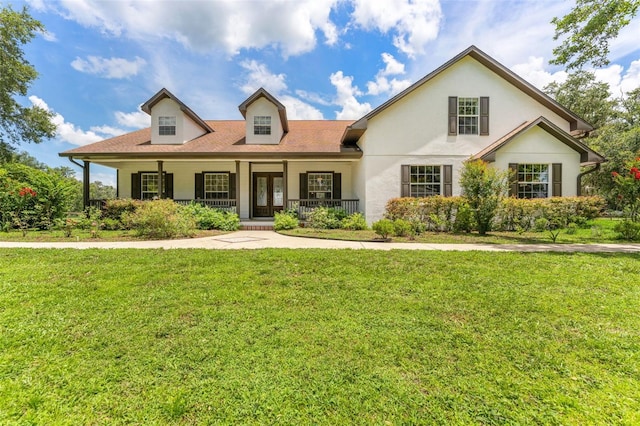 2702 Rogers Ranch Rd, Lithia, FL 33547 - view of front of home featuring a porch, a front lawn, and stucco siding