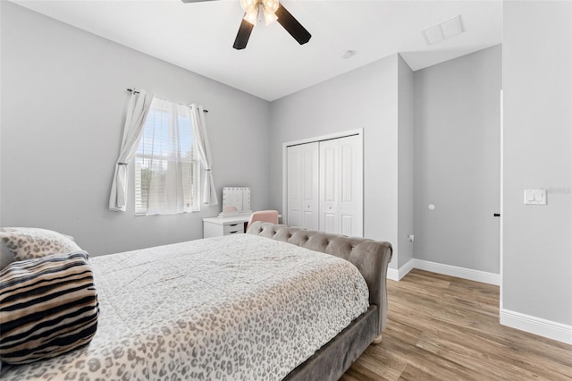 2702 Rogers Ranch Rd, Lithia, FL 33547 - bedroom with wood finished floors, a closet, and ceiling fan