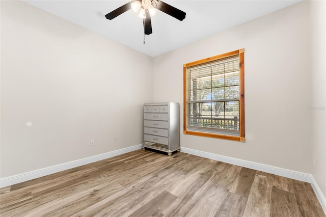 2702 Rogers Ranch Rd, Lithia, FL 33547 - empty room featuring light wood finished floors and ceiling fan