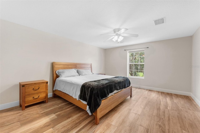 2702 Rogers Ranch Rd, Lithia, FL 33547 - bedroom featuring light wood finished floors and a ceiling fan