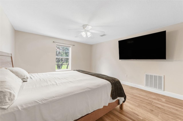 2702 Rogers Ranch Rd, Lithia, FL 33547 - bedroom with wood finished floors and ceiling fan