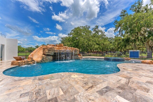 2702 Rogers Ranch Rd, Lithia, FL 33547 - view of swimming pool with a pool with connected hot tub, a water slide, and a patio area