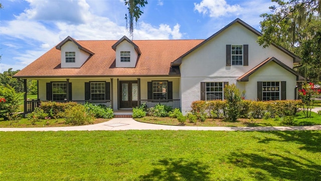 2702 Rogers Ranch Rd, Lithia, FL 33547 - view of front of home with a front yard and covered porch