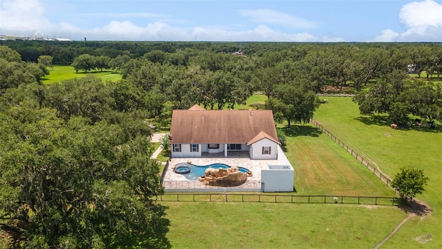 2702 Rogers Ranch Rd, Lithia, FL 33547 - aerial view of property and surrounding area with a pool area and a heavily wooded area