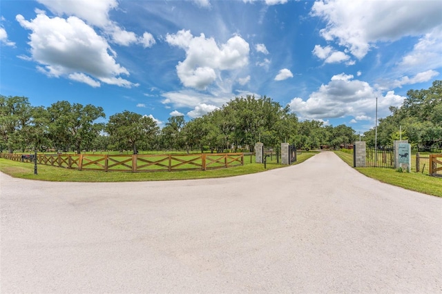 2702 Rogers Ranch Rd, Lithia, FL 33547 - view of road featuring a gate