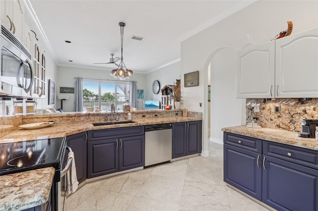 17001 NW 20th St, Pembroke Pines, FL 33028 - kitchen featuring appliances with stainless steel finishes, ornamental molding, white cabinets, backsplash, and light marble finish floors