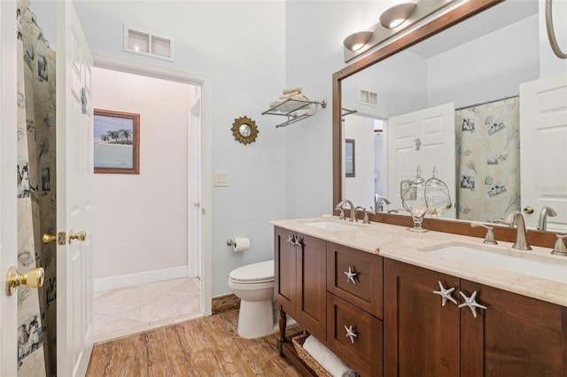 17001 NW 20th St, Pembroke Pines, FL 33028 - bathroom featuring double vanity and toilet