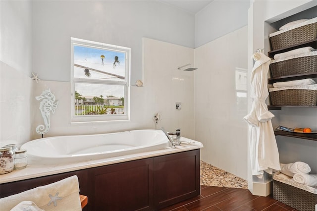 17001 NW 20th St, Pembroke Pines, FL 33028 - bathroom with a garden tub, wood finish floors, and a walk in shower