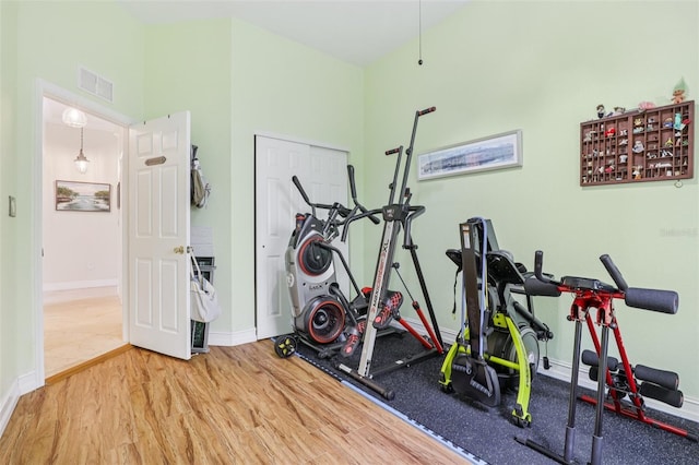 17001 NW 20th St, Pembroke Pines, FL 33028 - exercise room with baseboards and wood finished floors