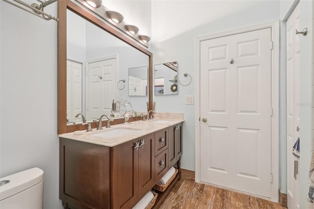 17001 NW 20th St, Pembroke Pines, FL 33028 - bathroom with double vanity and wood finished floors