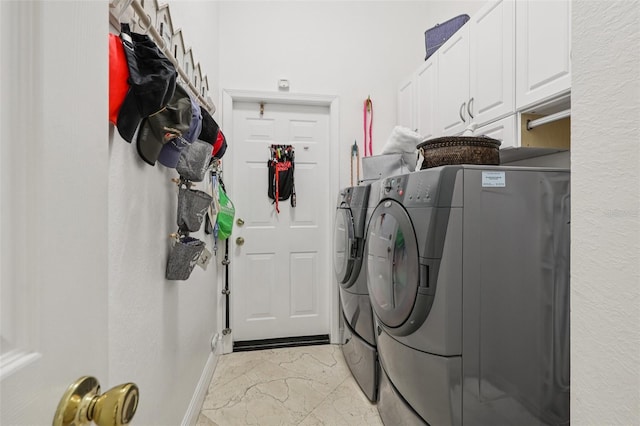 17001 NW 20th St, Pembroke Pines, FL 33028 - laundry area with separate washer and dryer, cabinet space, and light marble finish flooring