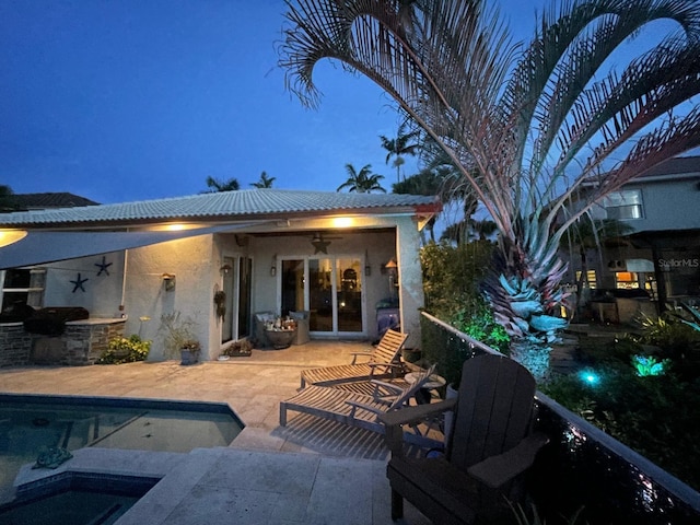 17001 NW 20th St, Pembroke Pines, FL 33028 - back of house with stucco siding, ceiling fan, a patio area, an in-ground hot tub, and an outdoor pool