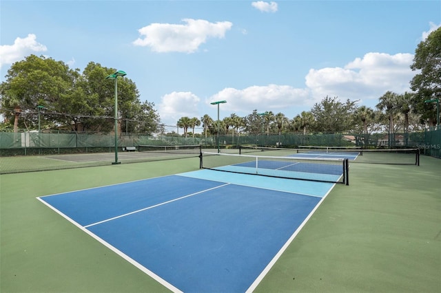 17001 NW 20th St, Pembroke Pines, FL 33028 - view of tennis court with community basketball court