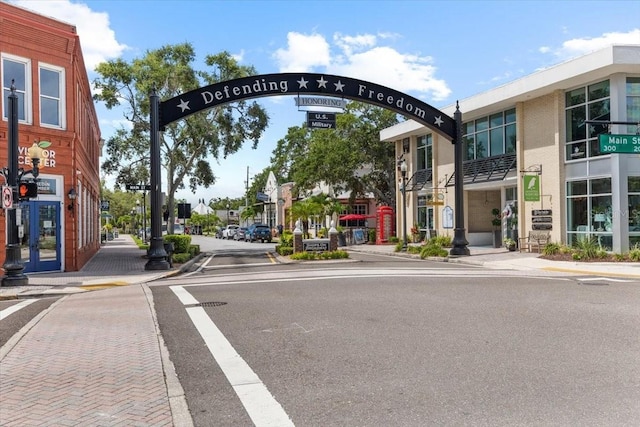 1222 Palm St, Clearwater, FL 33755 - view of asphalt street with sidewalks, curbs, and street lighting