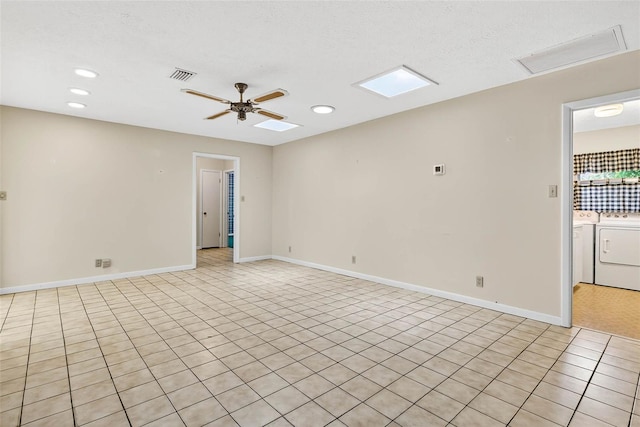 524 Garrard Dr, Temple Terrace, FL 33617 - empty room featuring independent washer and dryer, recessed lighting, a ceiling fan, and light tile patterned floors