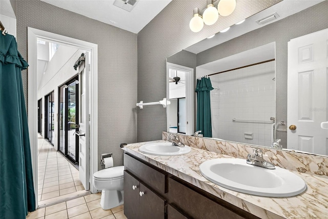 524 Garrard Dr, Temple Terrace, FL 33617 - full bath with tile patterned floors, double vanity, and curtained shower
