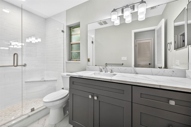 524 Garrard Dr, Temple Terrace, FL 33617 - full bath with marble look tiles, a shower stall, and vanity