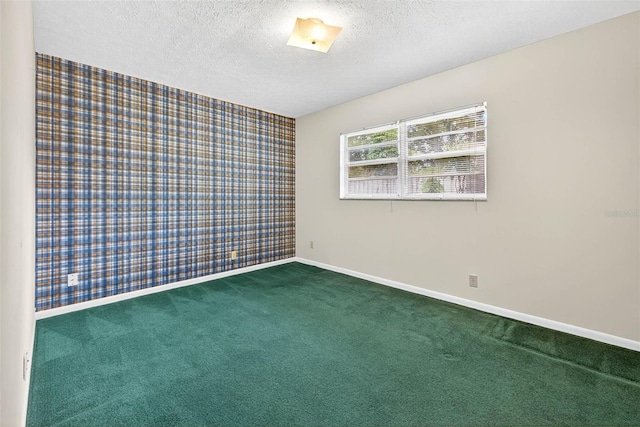 524 Garrard Dr, Temple Terrace, FL 33617 - unfurnished room with a textured ceiling, carpet floors, wallpapered walls, and an accent wall