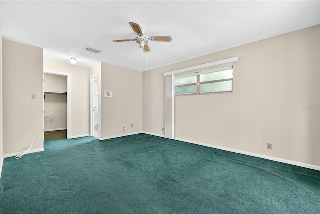 524 Garrard Dr, Temple Terrace, FL 33617 - unfurnished room with a ceiling fan and dark colored carpet