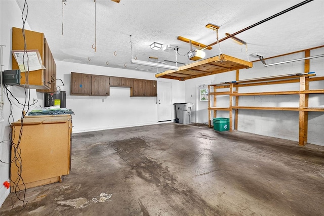 524 Garrard Dr, Temple Terrace, FL 33617 - garage with water heater and a garage door opener