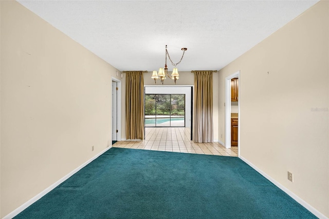 524 Garrard Dr, Temple Terrace, FL 33617 - spare room with a chandelier, carpet flooring, and tile patterned flooring