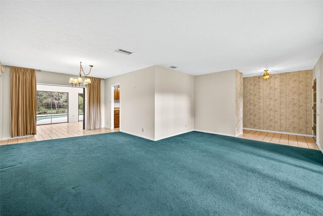 524 Garrard Dr, Temple Terrace, FL 33617 - empty room with a chandelier, carpet flooring, and wallpapered walls