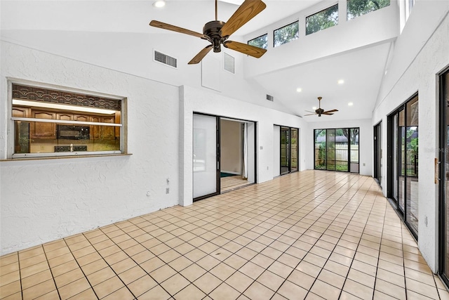 524 Garrard Dr, Temple Terrace, FL 33617 - unfurnished sunroom with healthy amount of natural light and vaulted ceiling