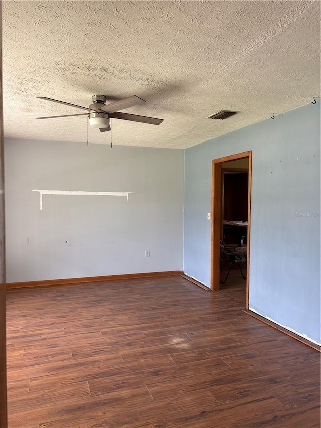 1214 Mitchell St, Brandon, FL 33511 - unfurnished room featuring wood finished floors, a textured ceiling, and ceiling fan