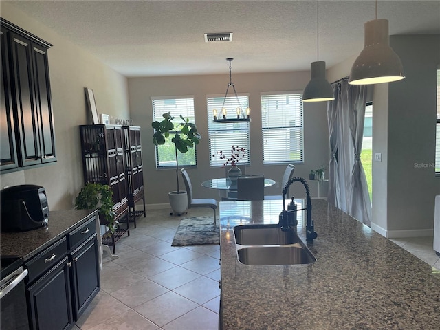 1596 Ludington Ave, Wesley Chapel, FL 33543 - dining space featuring a textured ceiling