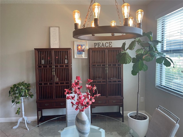 1596 Ludington Ave, Wesley Chapel, FL 33543 - detailed view of baseboards and a chandelier
