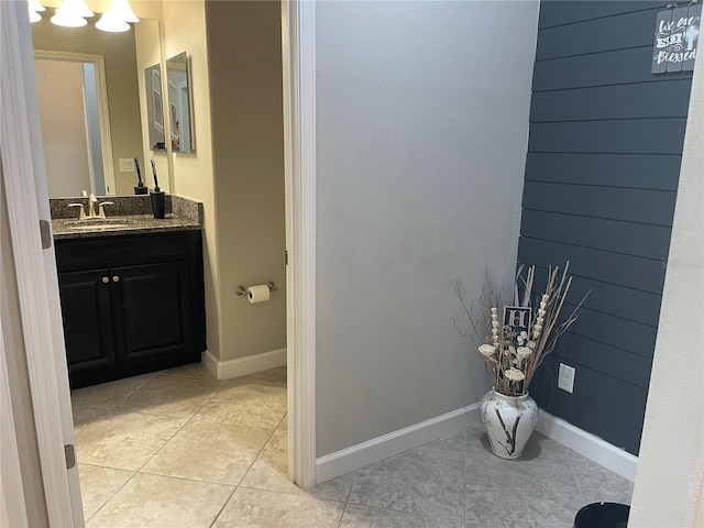 1596 Ludington Ave, Wesley Chapel, FL 33543 - bathroom featuring tile patterned floors and vanity