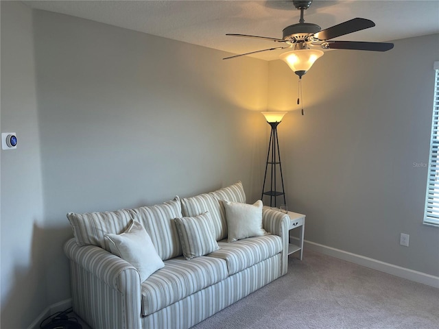 1596 Ludington Ave, Wesley Chapel, FL 33543 - living area featuring a ceiling fan and light colored carpet