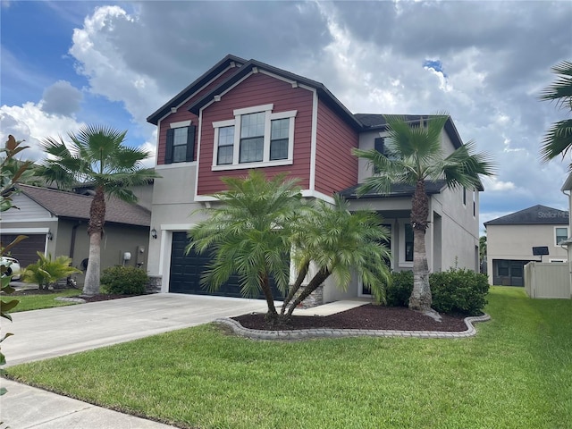 1596 Ludington Ave, Wesley Chapel, FL 33543 - view of front facade with concrete driveway, an attached garage, a front yard, and stucco siding
