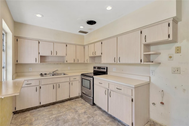 603 Clay Ct, Brandon, FL 33510 - kitchen featuring stainless steel range with electric stovetop, open shelves, and light countertops