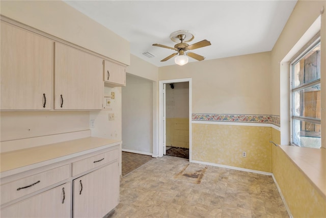 603 Clay Ct, Brandon, FL 33510 - kitchen with ceiling fan, light countertops, and light brown cabinets