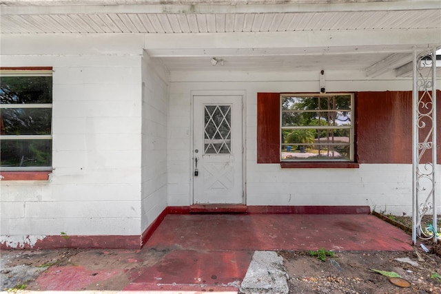 603 Clay Ct, Brandon, FL 33510 - property entrance with concrete block siding and a porch