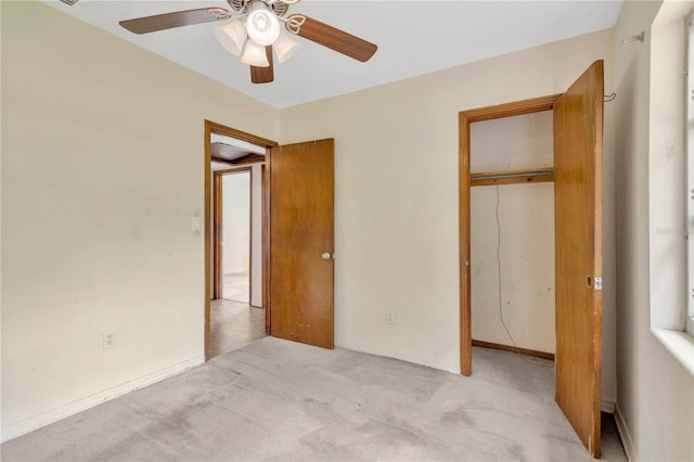 603 Clay Ct, Brandon, FL 33510 - unfurnished bedroom featuring a closet, light carpet, and a ceiling fan