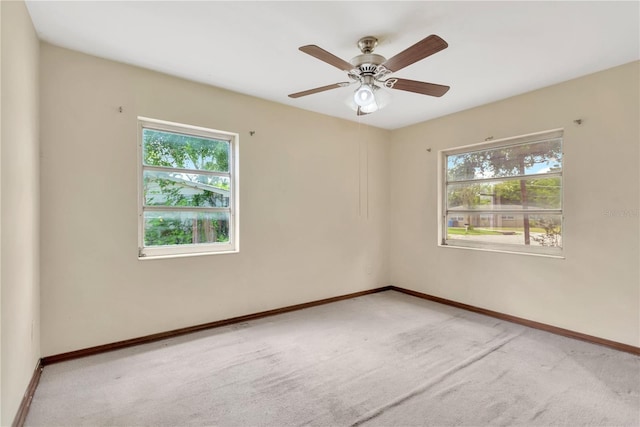 603 Clay Ct, Brandon, FL 33510 - unfurnished room featuring plenty of natural light, carpet flooring, and a ceiling fan