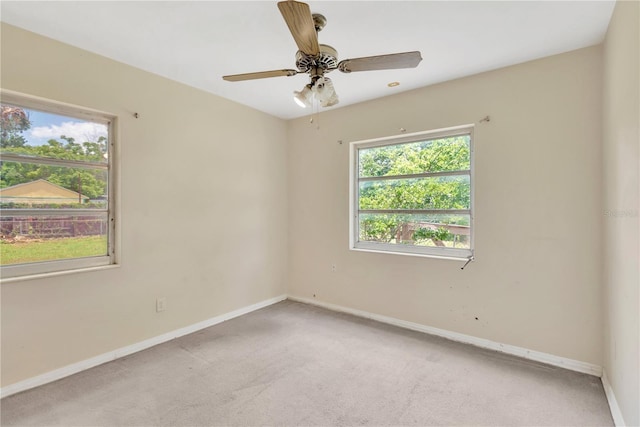 603 Clay Ct, Brandon, FL 33510 - spare room featuring light colored carpet and a ceiling fan